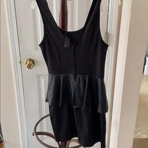 Black mini dress with leather mid skirt